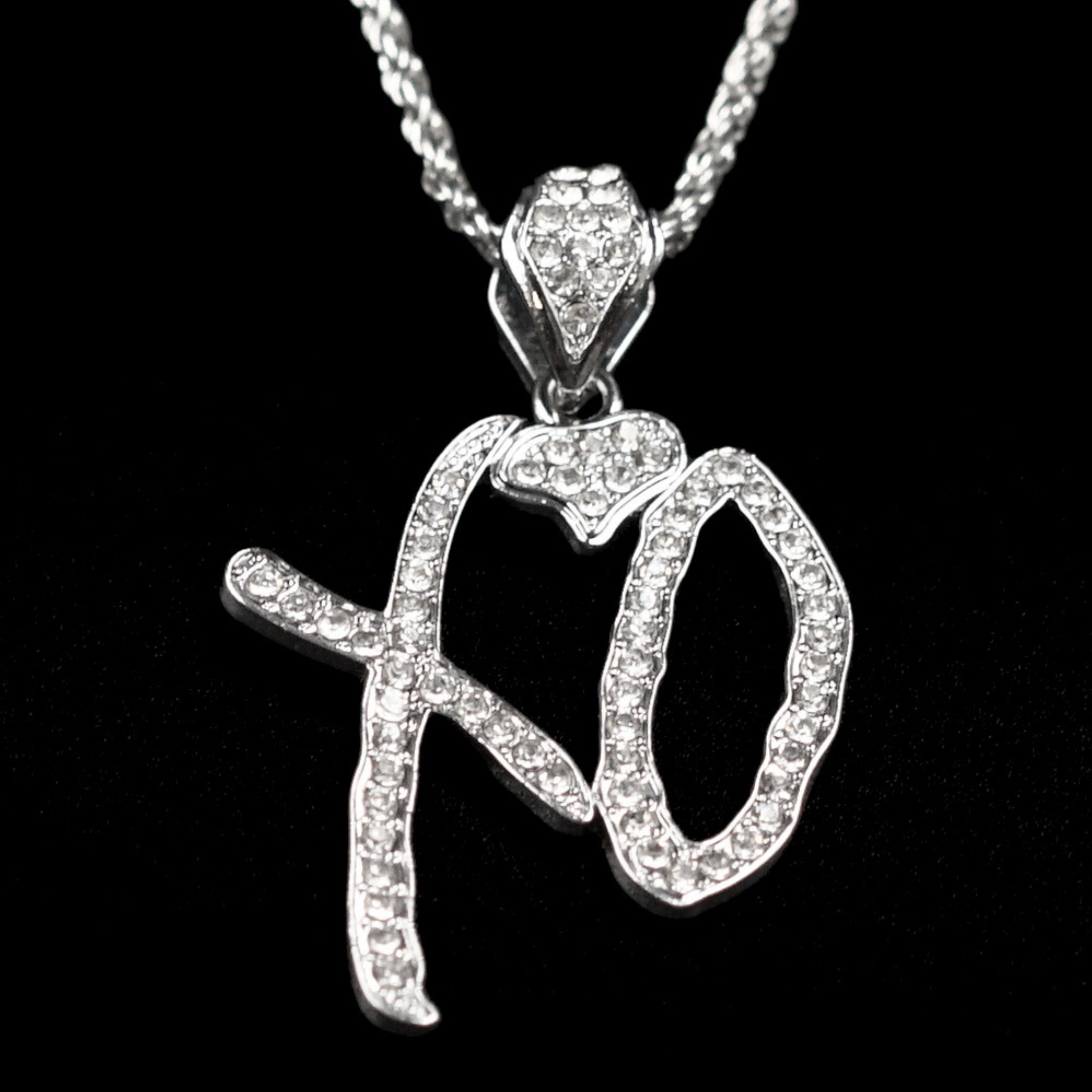 XO rhinestone pendant necklace with a custom chain for concert styling